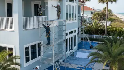 Professional painters in Clearwater, FL completing a residential interior painting project